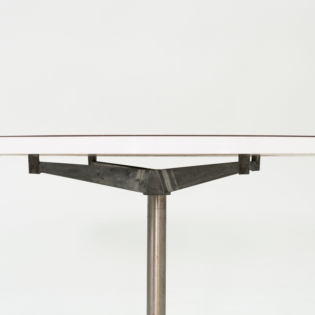 Linear Group Round Dining Table