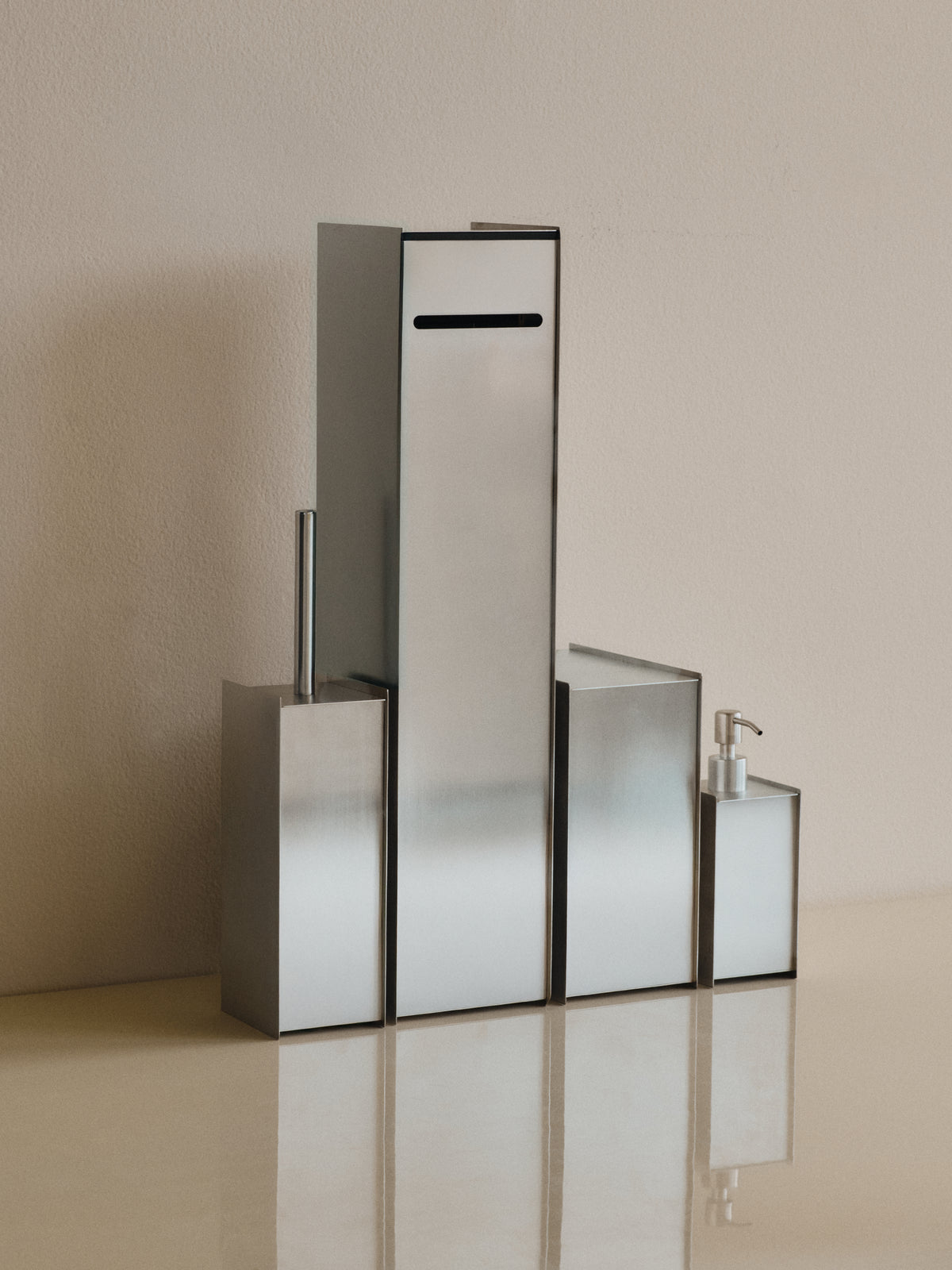 Sama Toilet Paper Dispenser - Brushed Steel