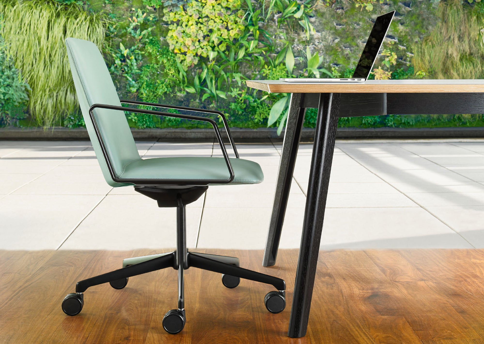 L.A.M. Swivel Armchair — Mid-Back