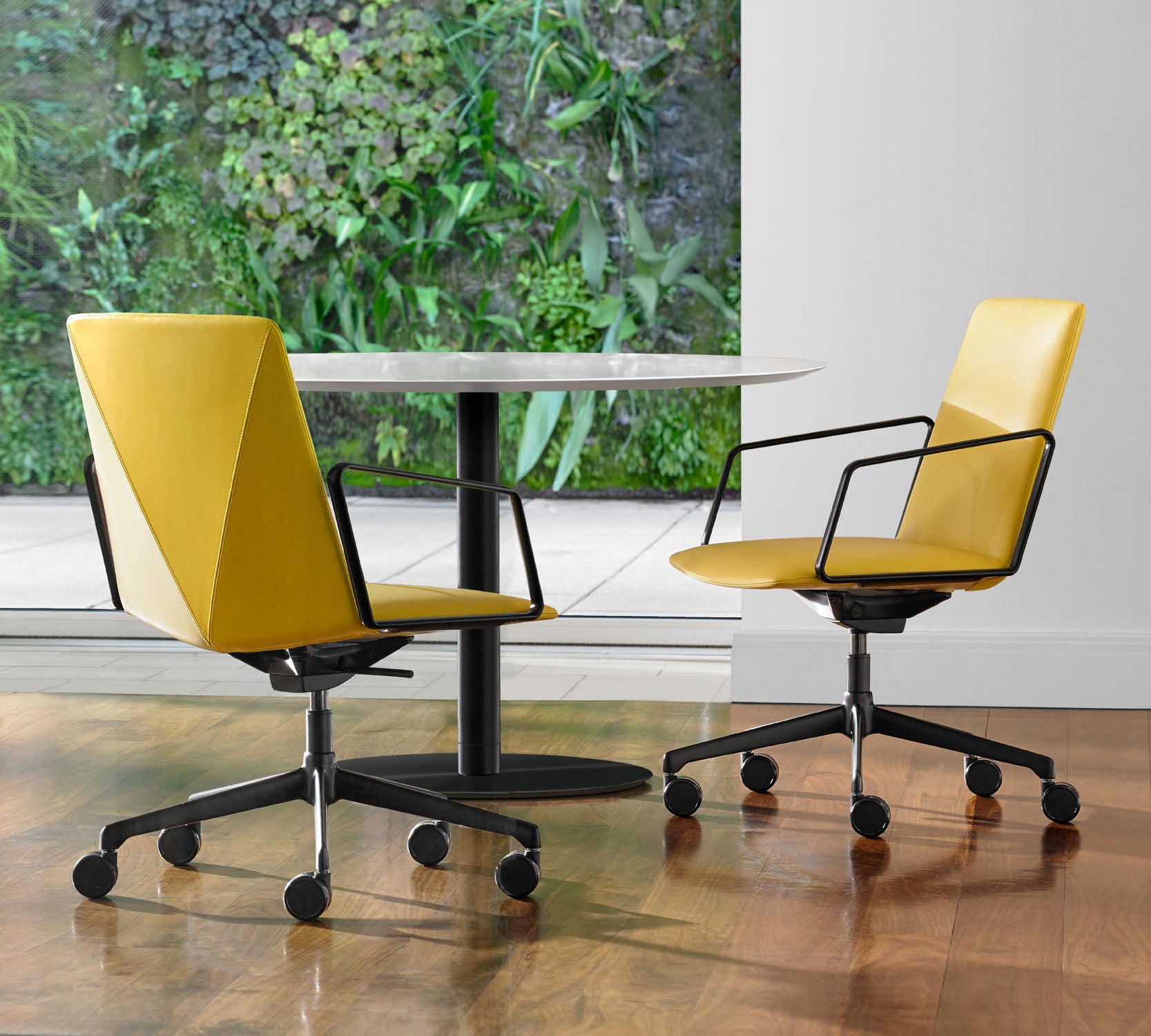 L.A.M. Swivel Armchair — Mid-Back