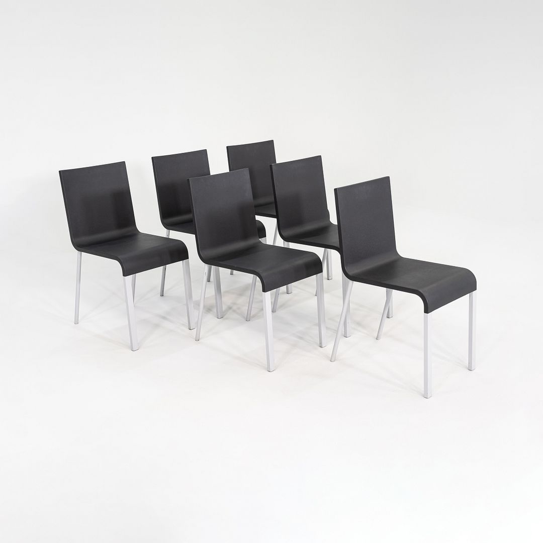 .03 Stacking Dining Chairs