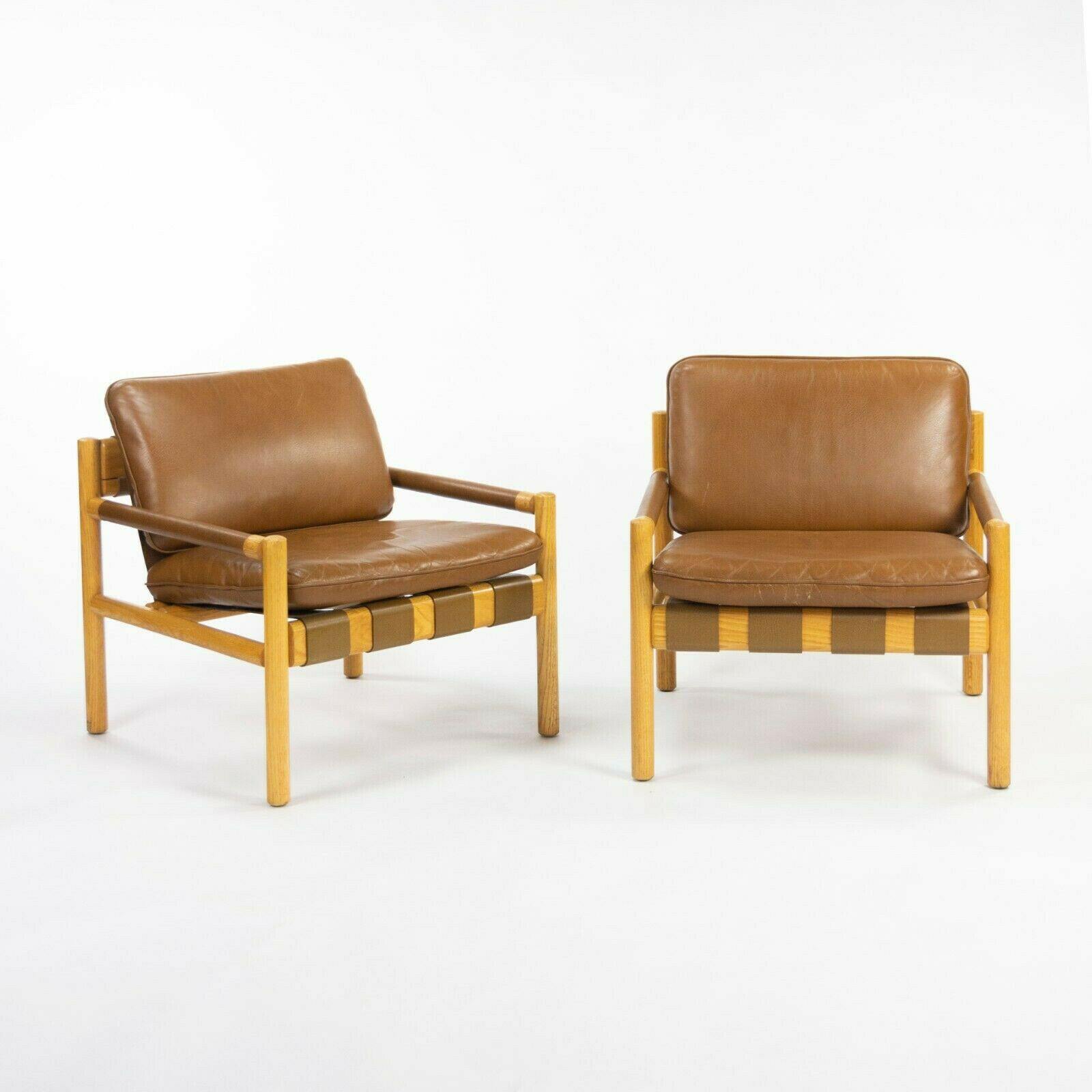 Pair 1976 Nicos Zographos Saronis Leather and Oak Lounge Chairs