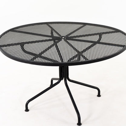 Sculptura Round Dining Table
