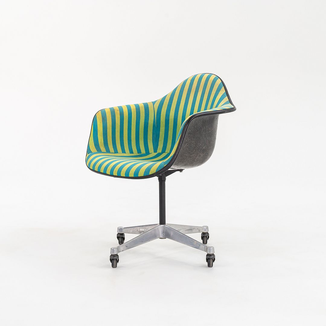 PACC Pivoting Arm Chairs with Casters by Charles and Ray Eames
