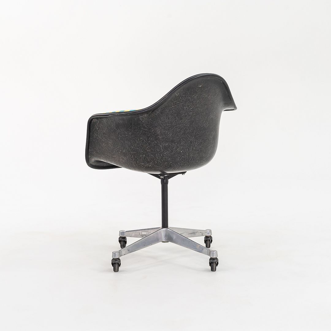 PACC Pivoting Arm Chairs with Casters by Charles and Ray Eames