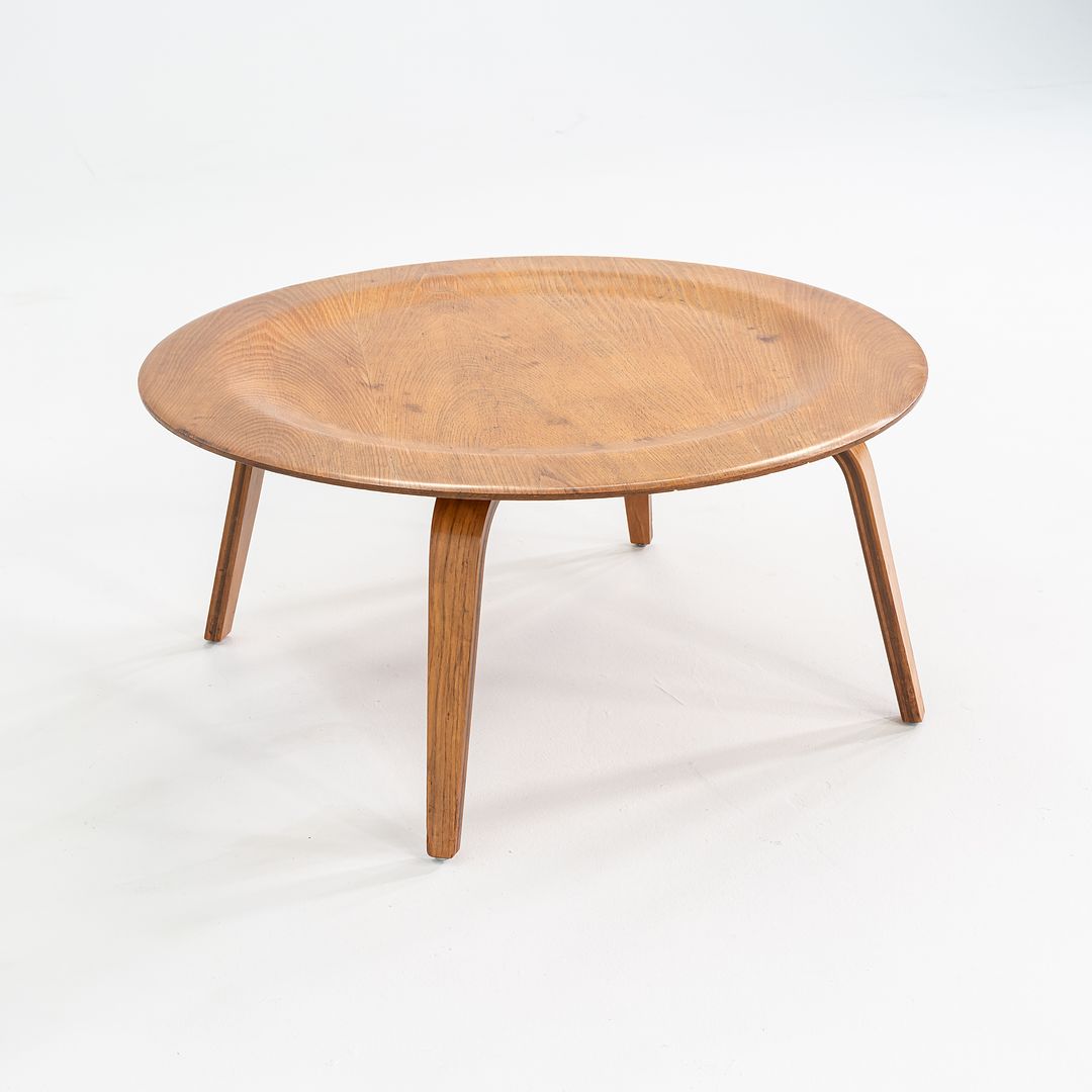 CTW Circular Wood Leg Coffee Table by Ray and Charles Eames CTW Circular Wood Leg Coffee Table by Ray and Charles Eames