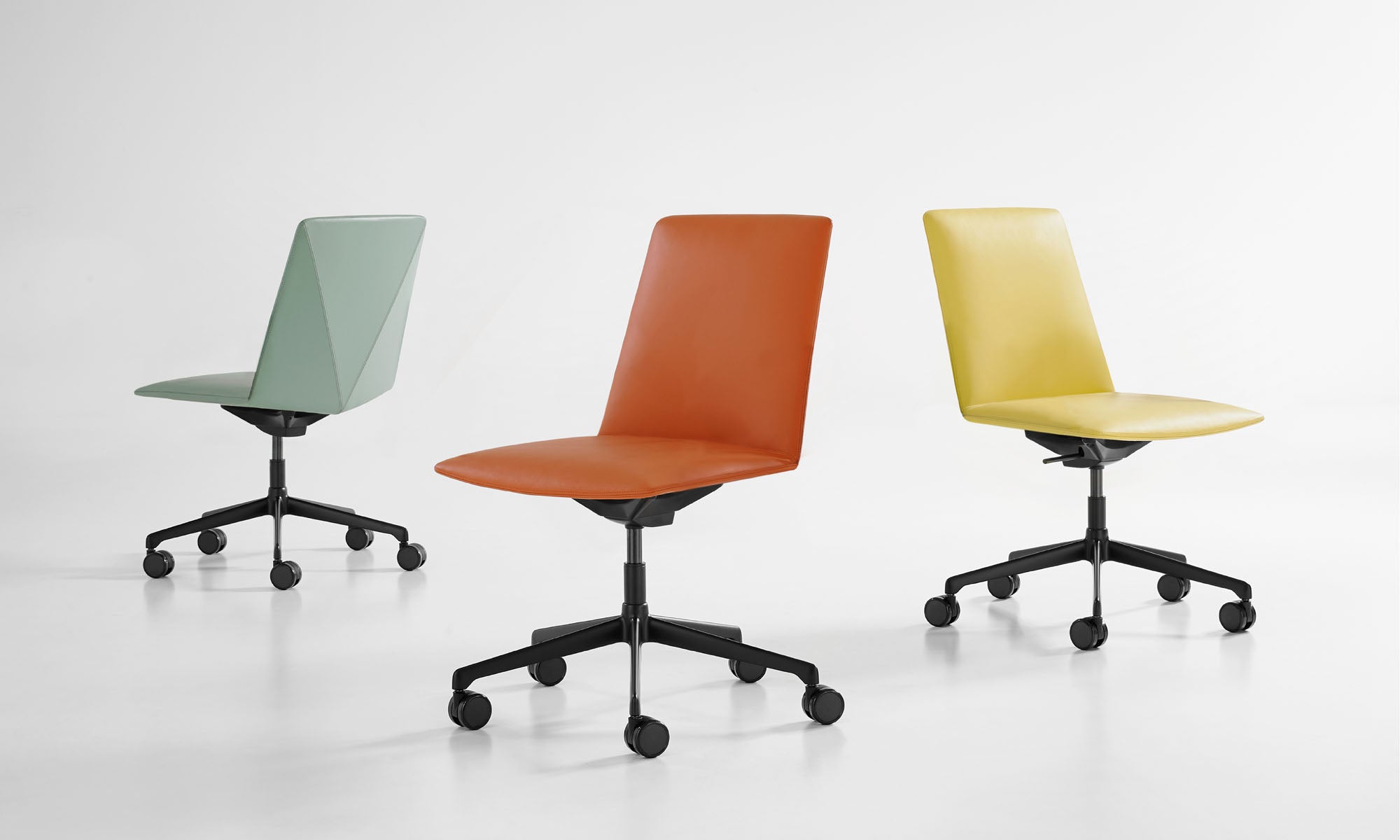 L.A.M. Swivel Chair — Mid-Back